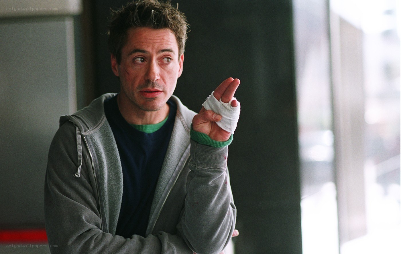 man with bandaged hand