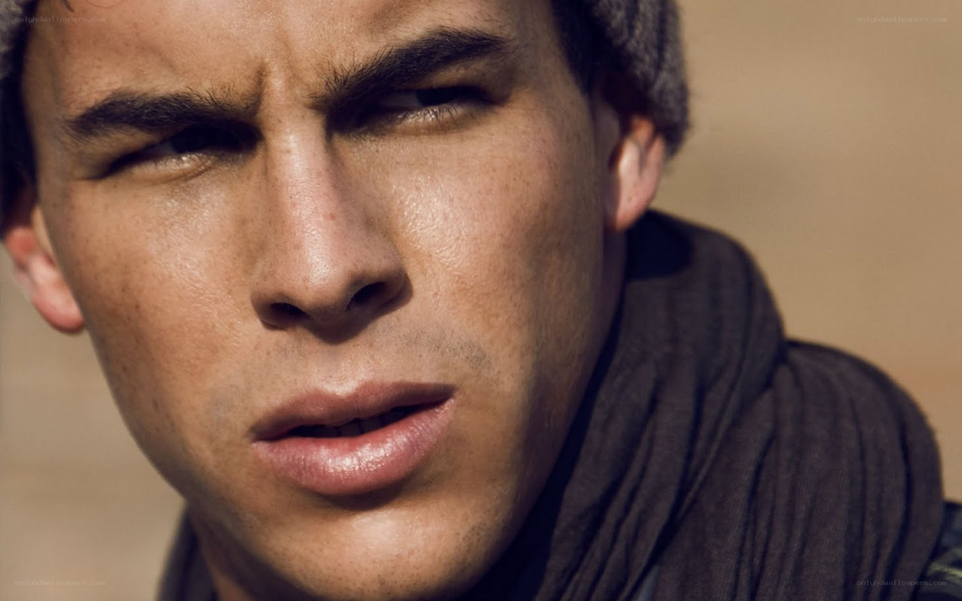 man with beanie and scarf