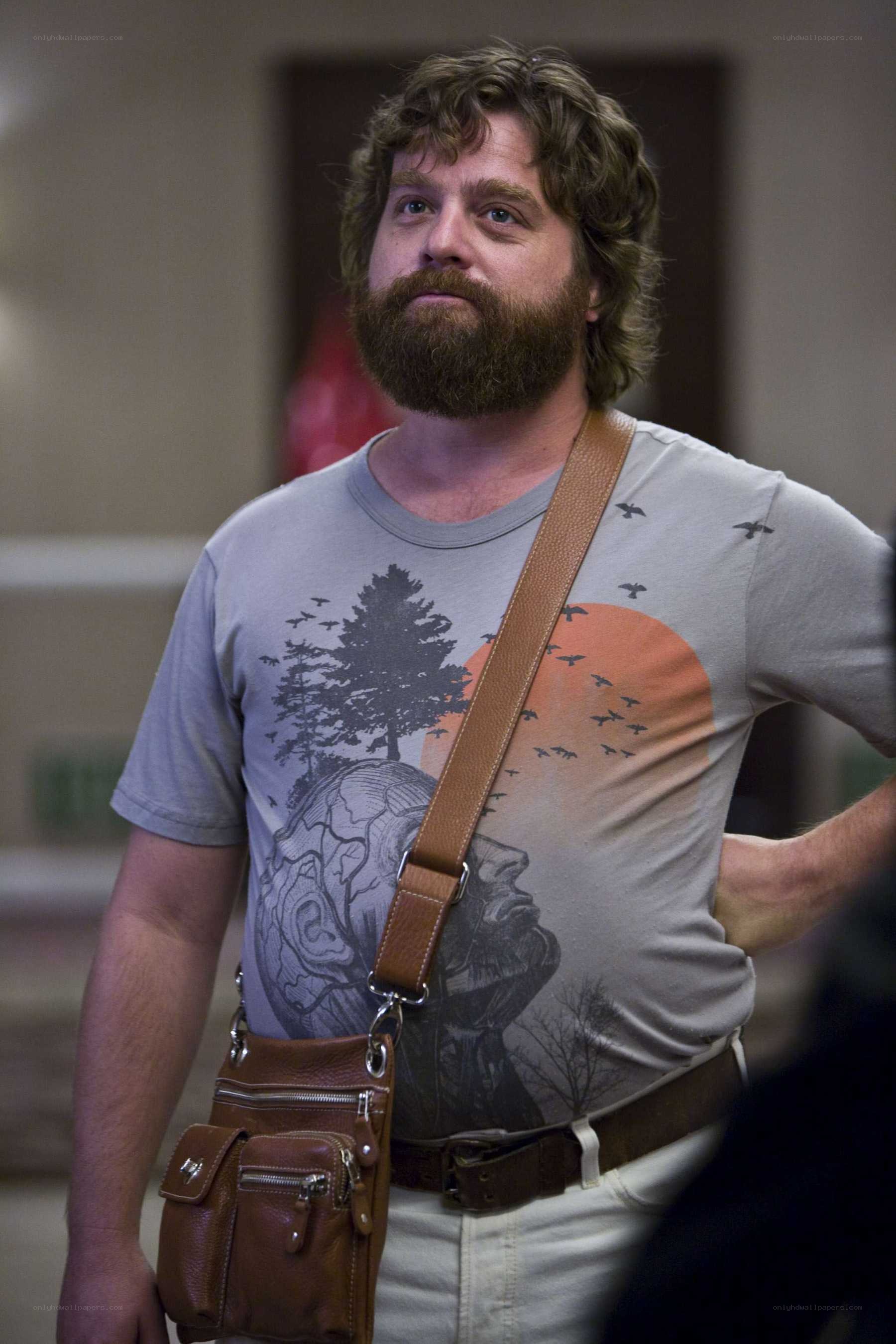 man with beard and bag