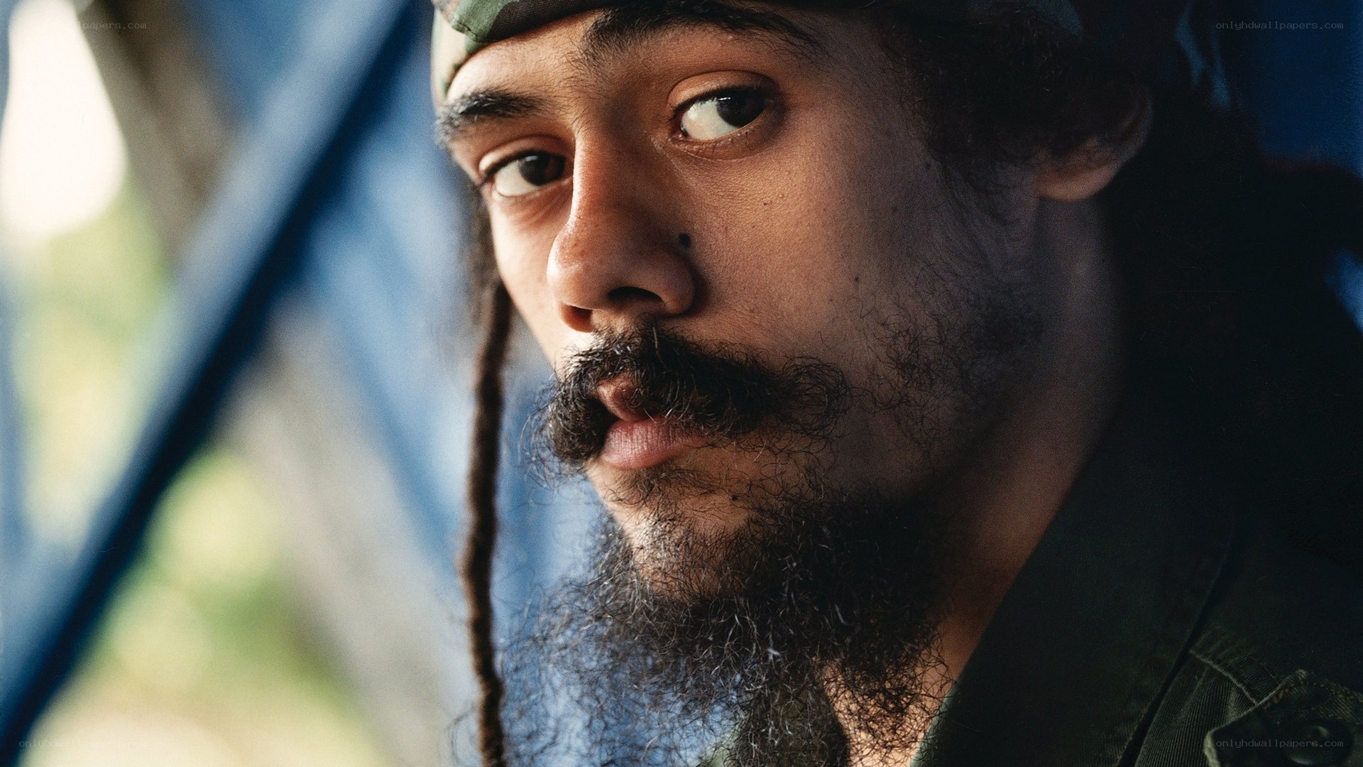 man with beard and bandana