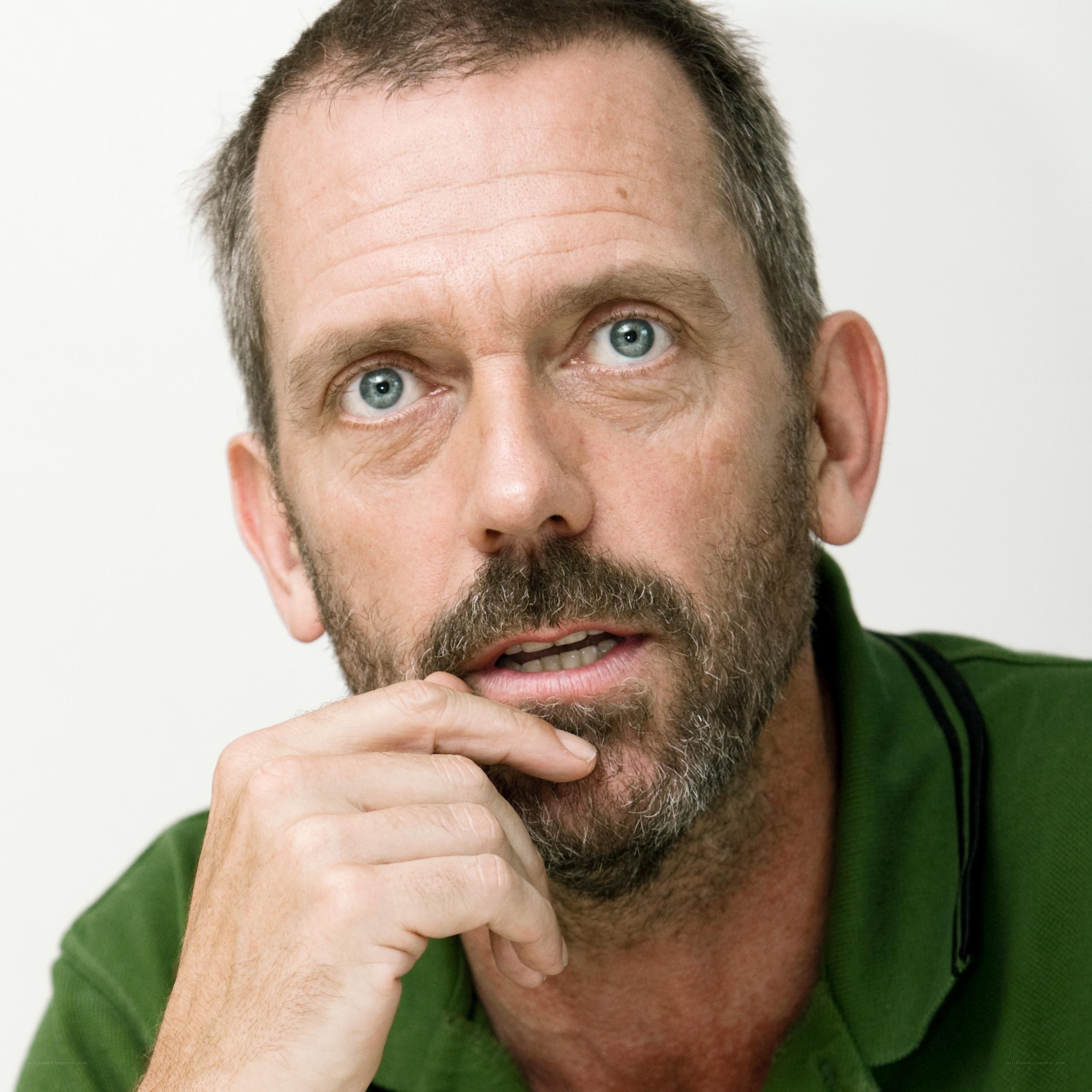 man with beard and green shirt