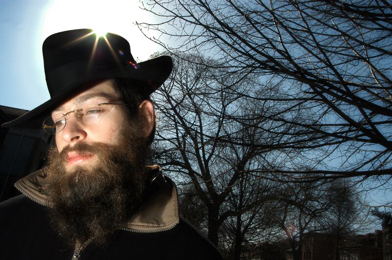 man with beard and hat