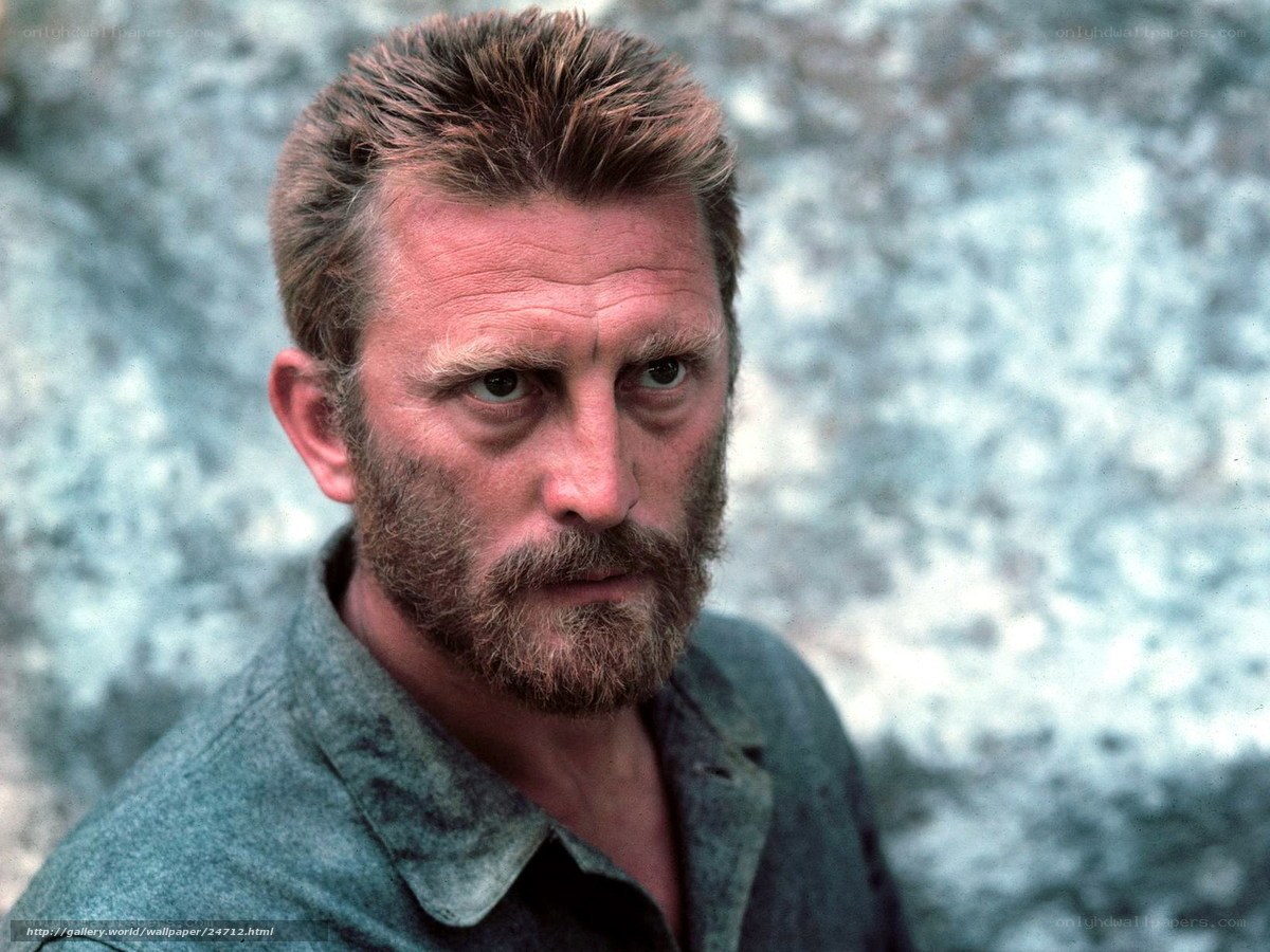man with beard and intense gaze