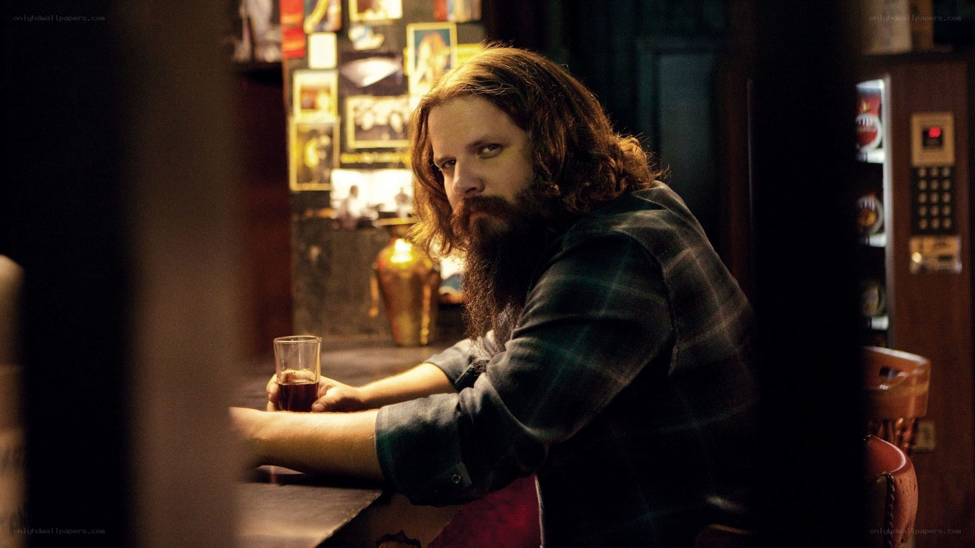 man with beard at bar