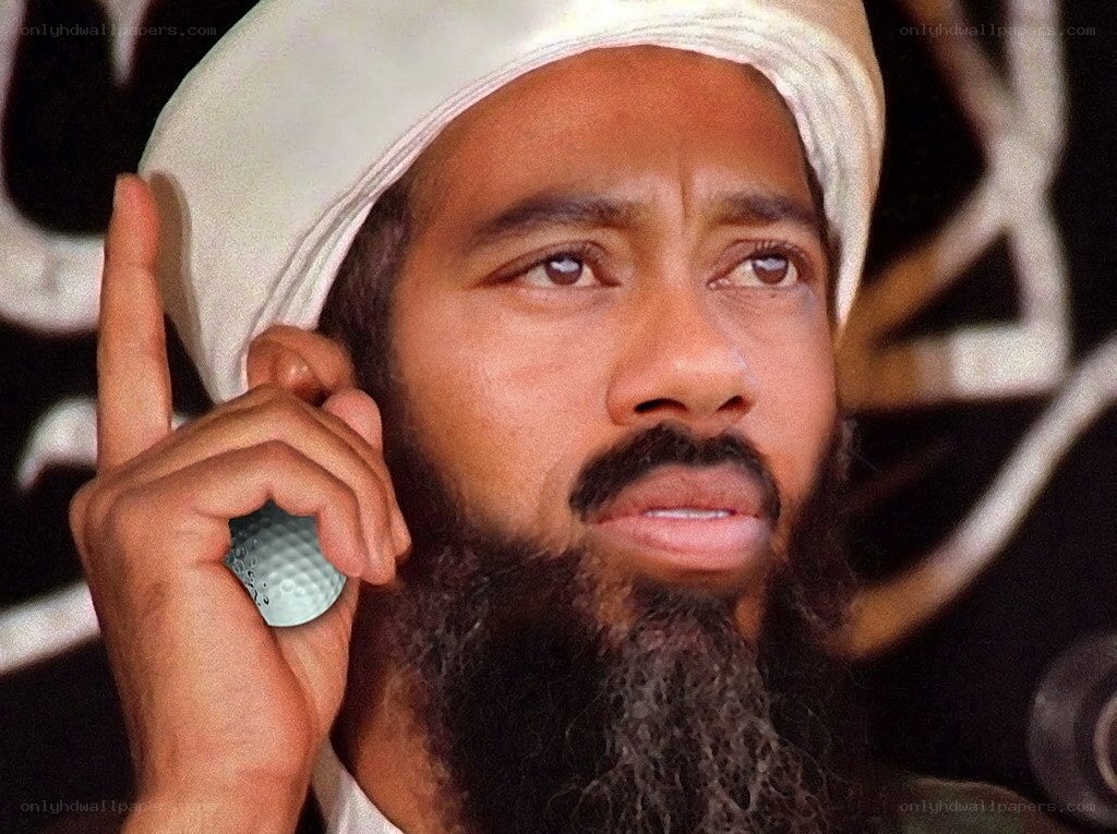 Man with beard holding golf ball