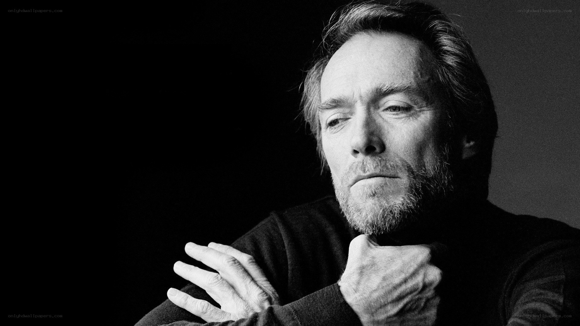 man with beard in black and white