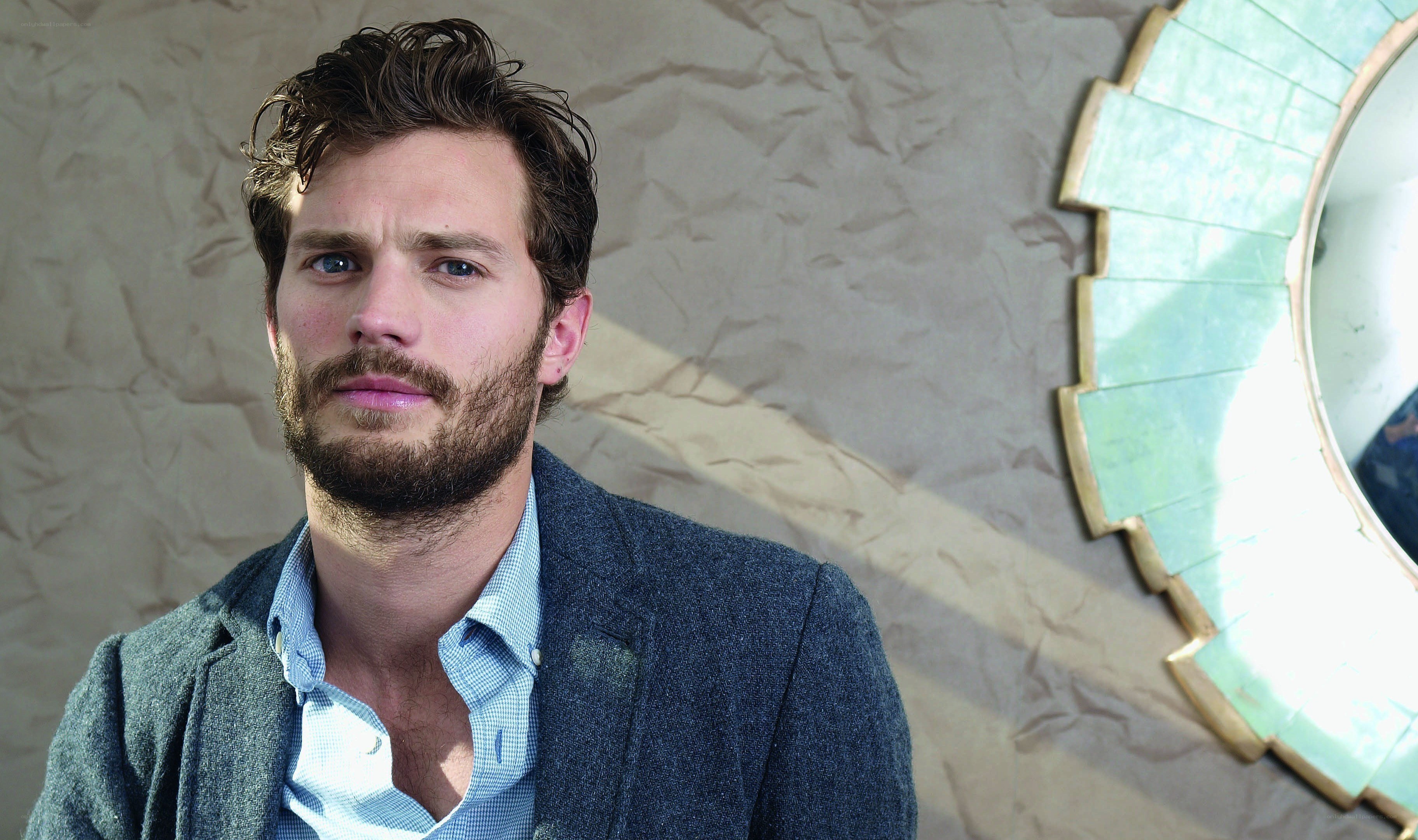 man with beard in blazer