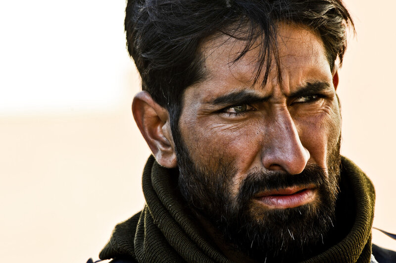 man with beard in desert