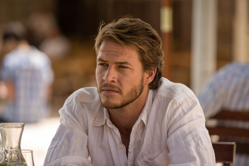 Man with Beard in White Shirt