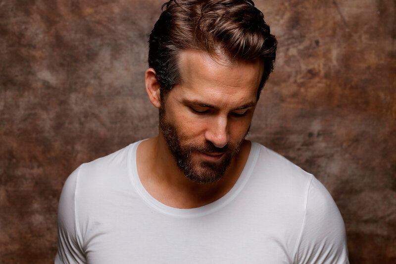 Man with Beard Looking Down — White