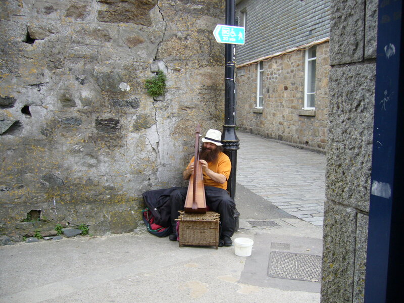Man with Beard Playing Harp