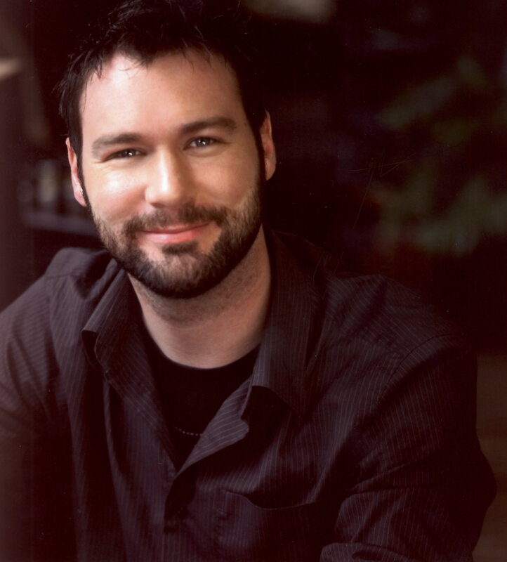 man with beard smiling