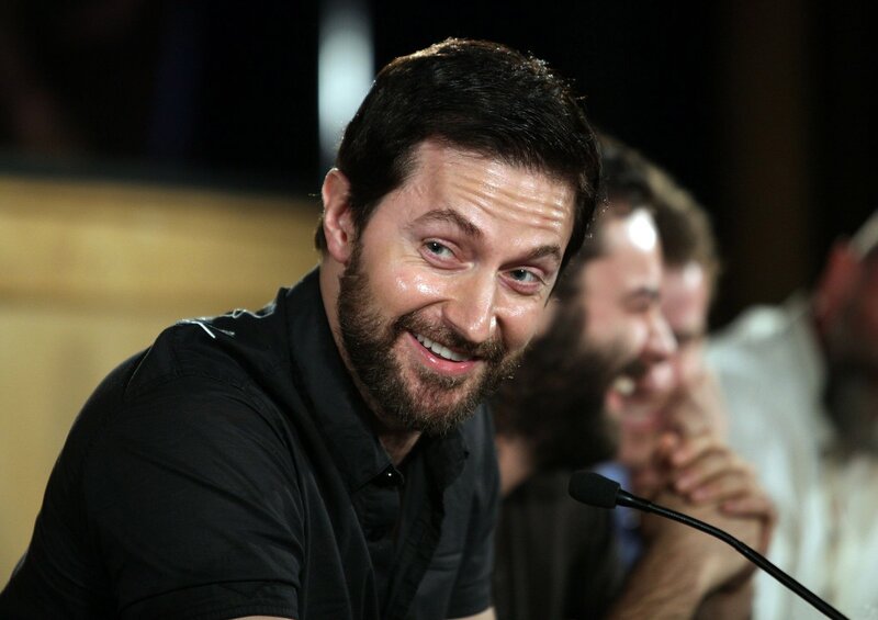 Man with Beard Smiling — Black, Engaged