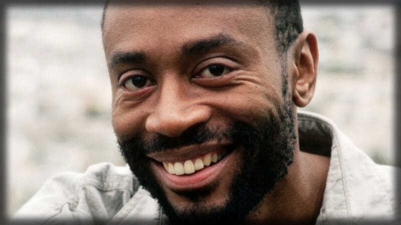 man with beard smiling