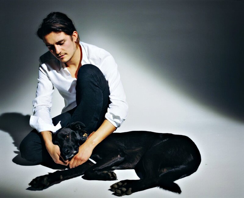 Man with Black Dog — Dramatic, Photograph
