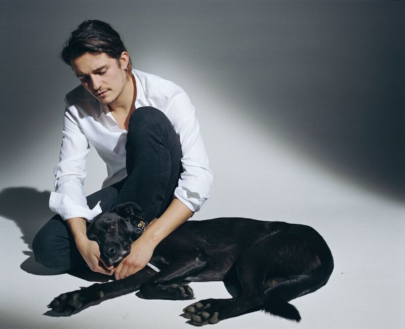 man with black dog