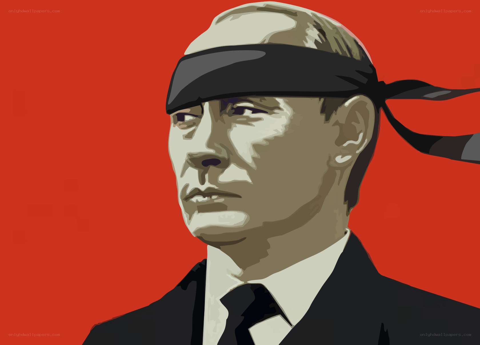 man with blindfold in suit