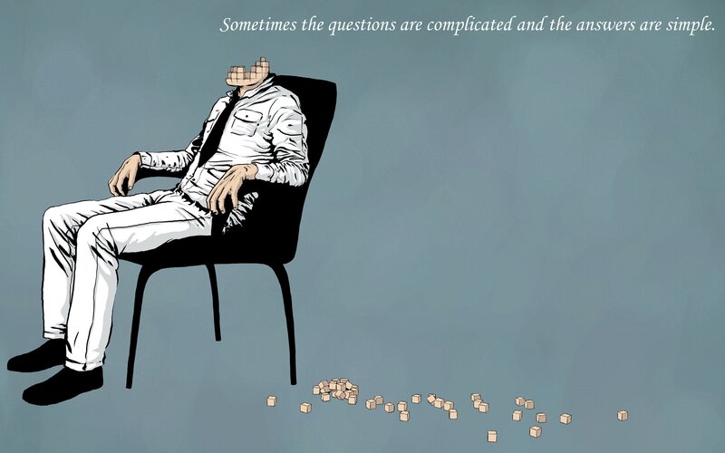 Man with block head sitting