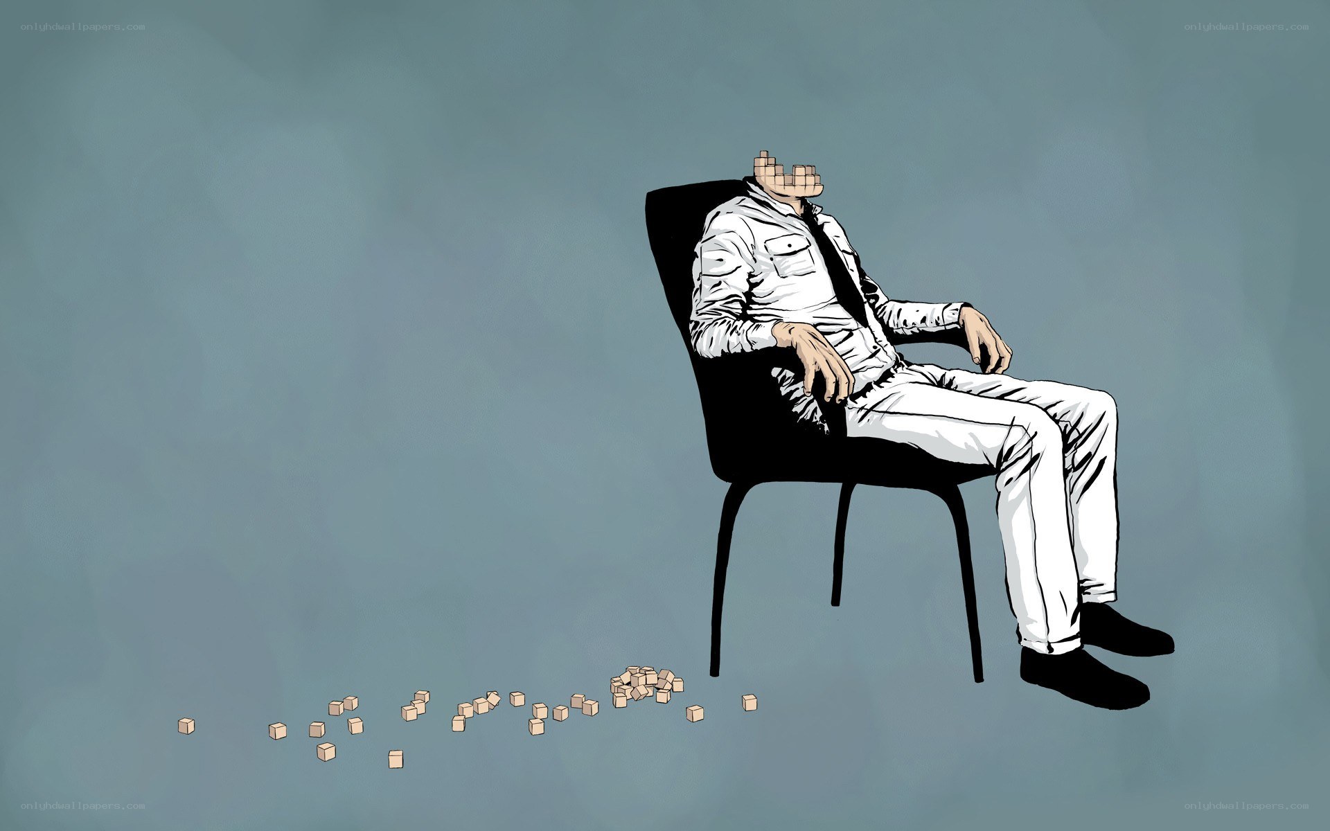 Man with blocky head sitting in chair
