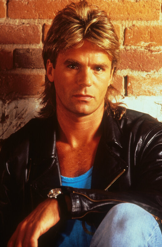 Man with Blonde Hair — Black, Serious, Photograph, Brick Wall