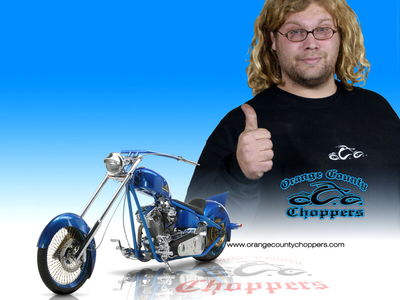Man with blue chopper motorcycle