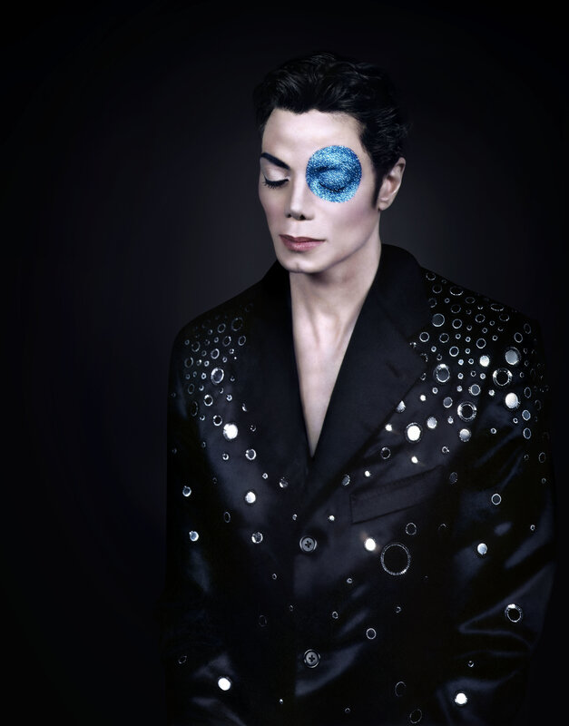 Man with blue eye makeup
