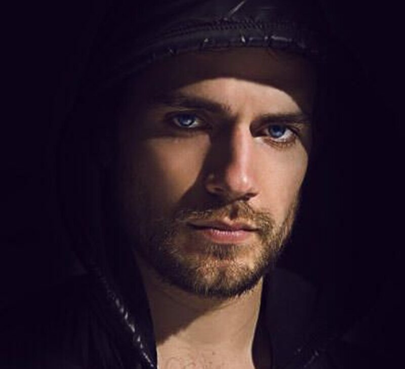 Man with Blue Eyes — Black, Dramatic, Photograph, Beard, Hoodie