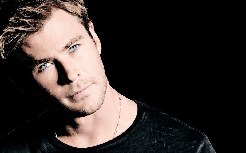 Man with Blue Eyes — Black, Dramatic, Photograph, Necklace, Black Shirt