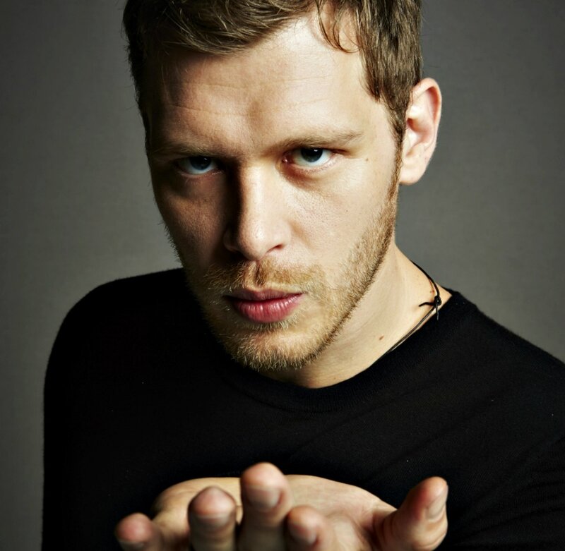 Man with Blue Eyes — Black, Intense, Photograph