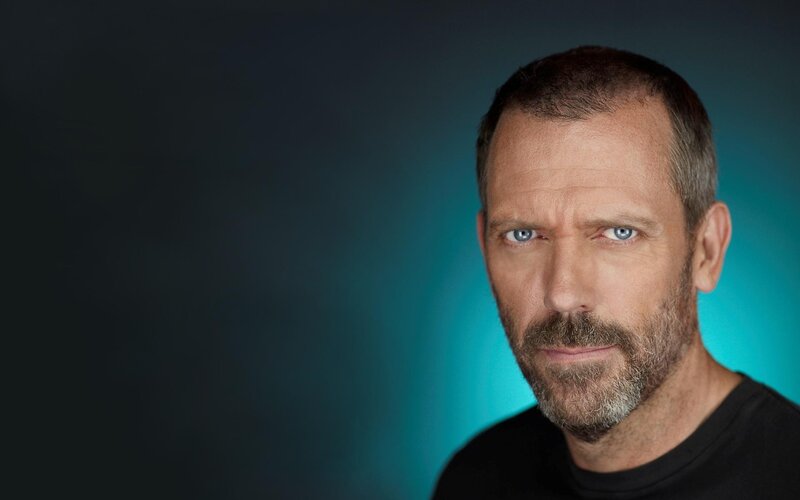 Man with Blue Eyes — Black, Serious, Photograph, Beard, Black Shirt, Blue Background