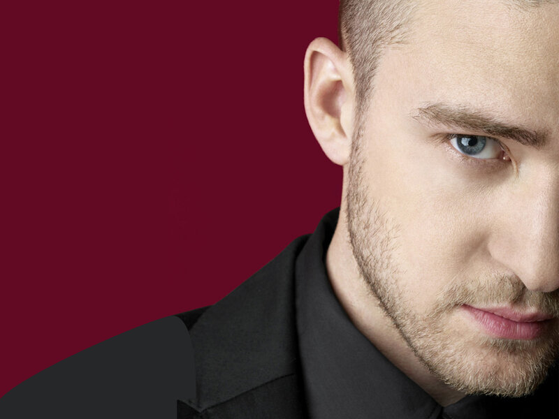 man with blue eyes in black shirt