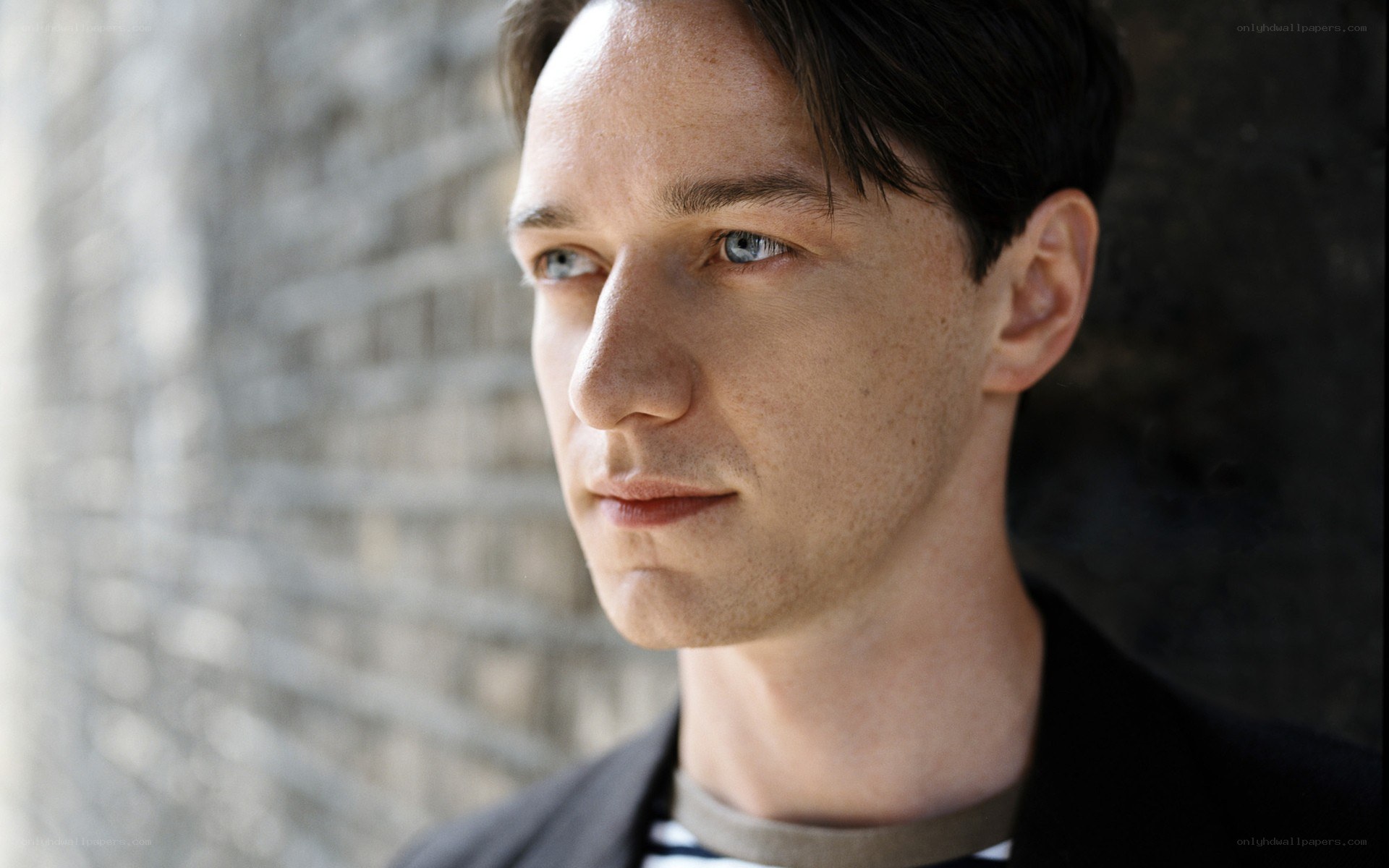 man with blue eyes looking away