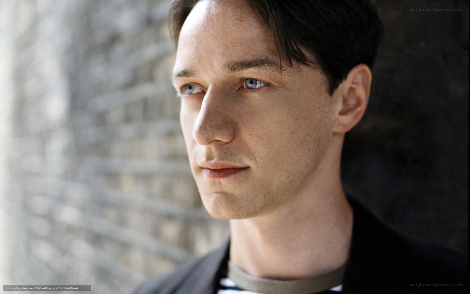 man with blue eyes looking away