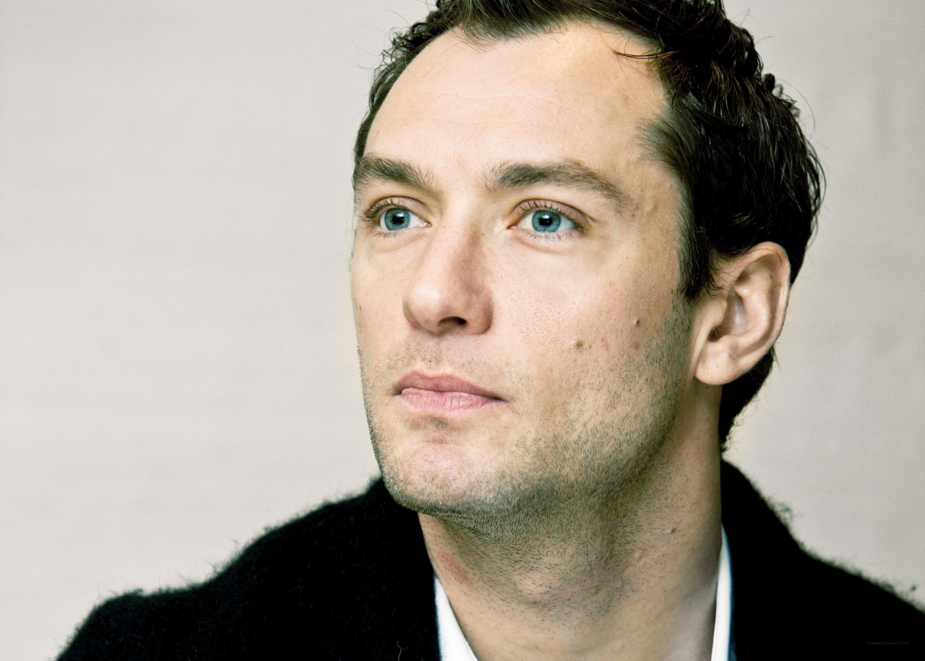 man with blue eyes looking up