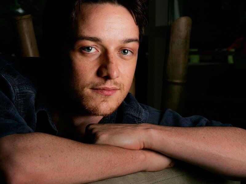 man with blue eyes resting arms