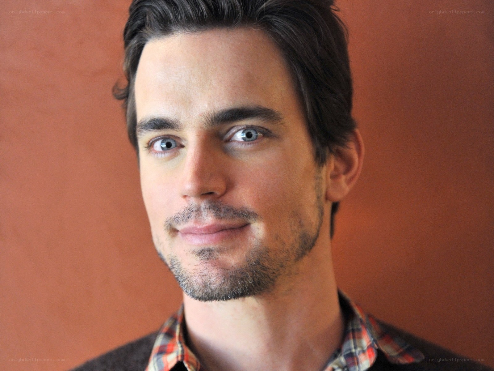 man with blue eyes smiling