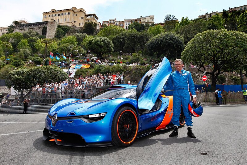Man with blue race car