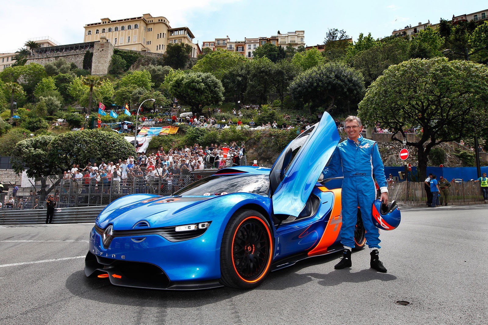 Man with blue race car