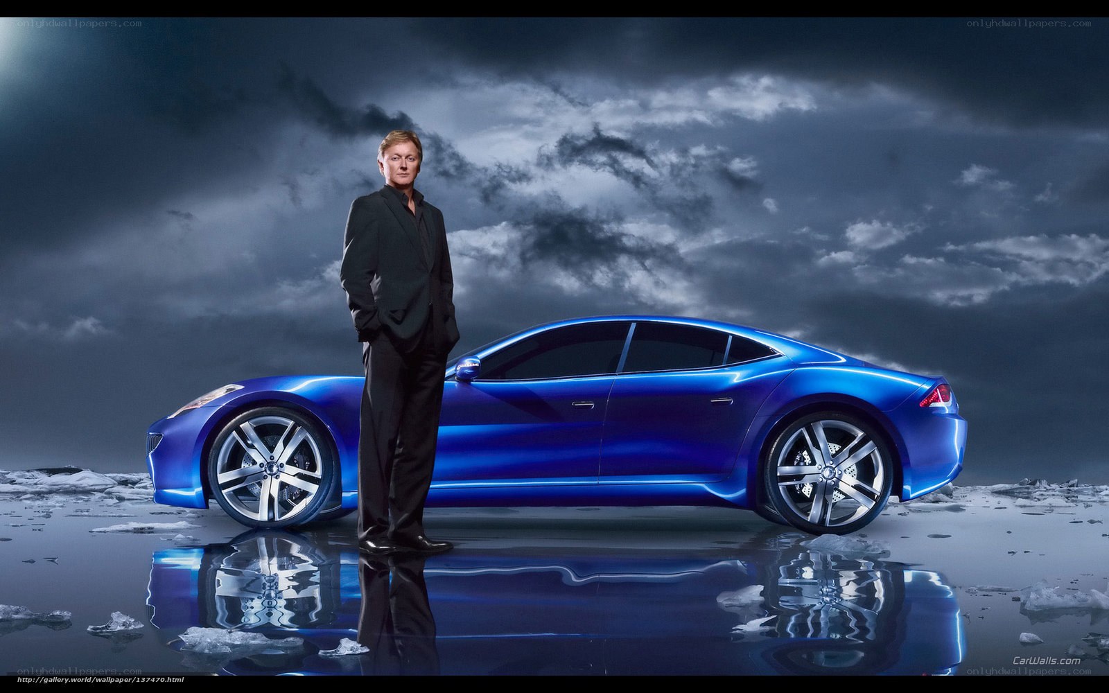 Man with blue sports car