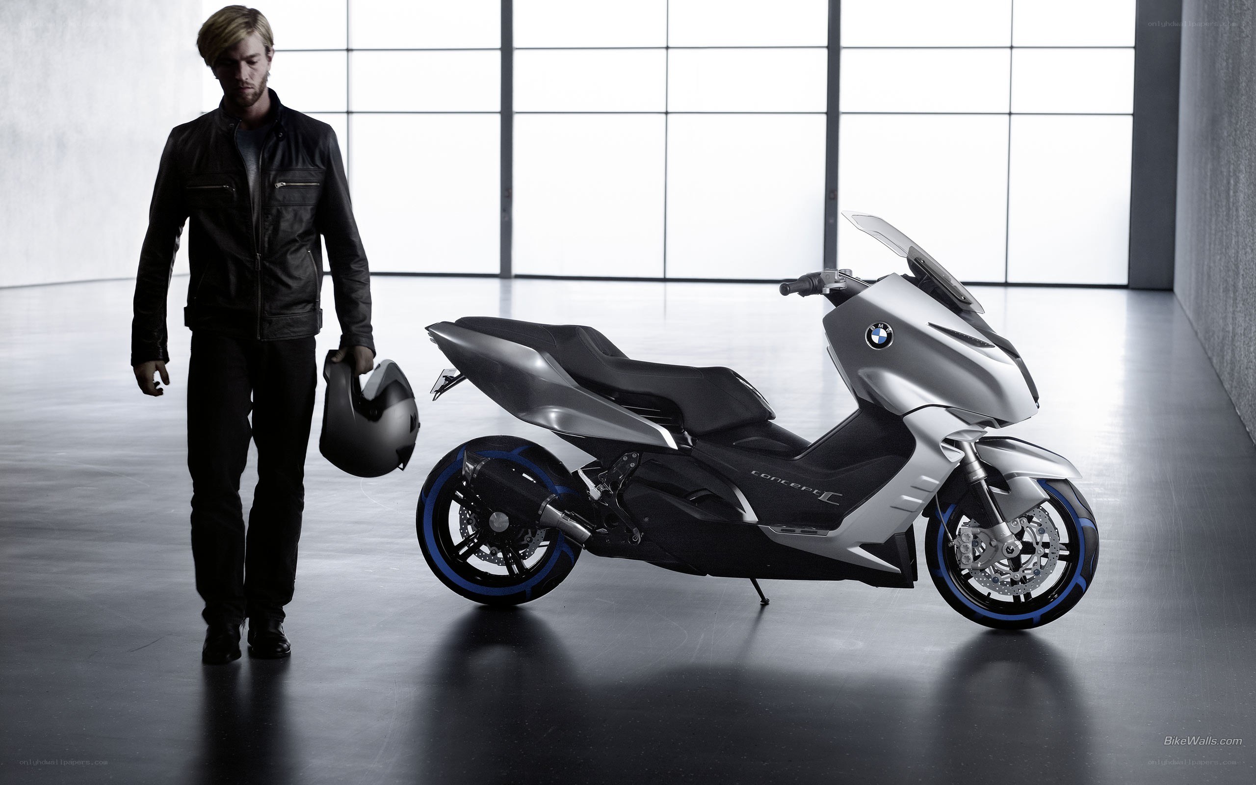Man with BMW scooter