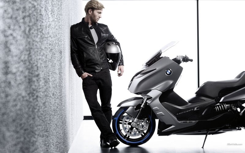 Man with BMW scooter