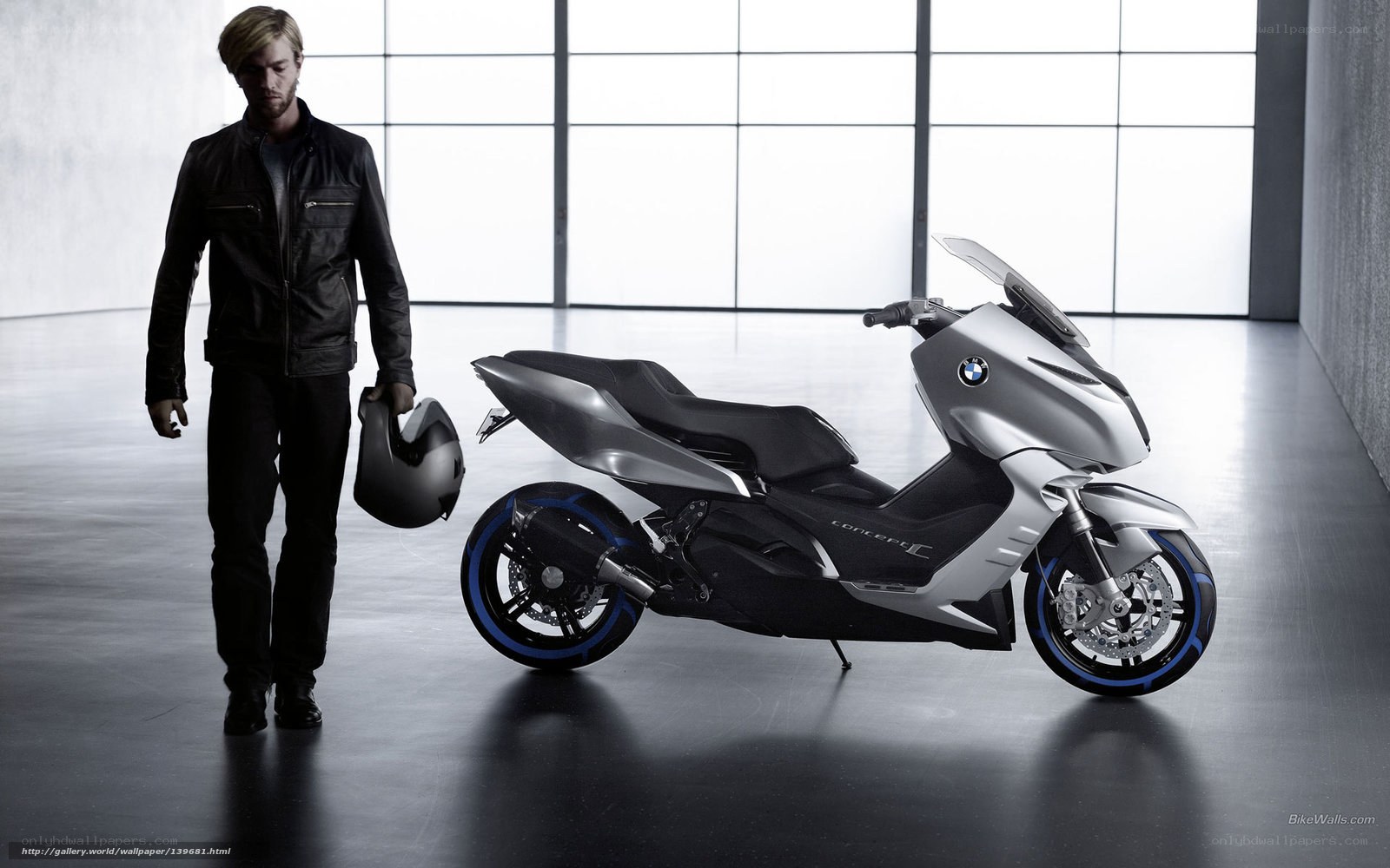 Man with BMW scooter