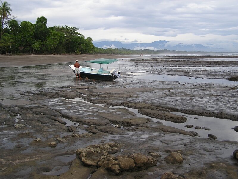 Man with Boat on Beach