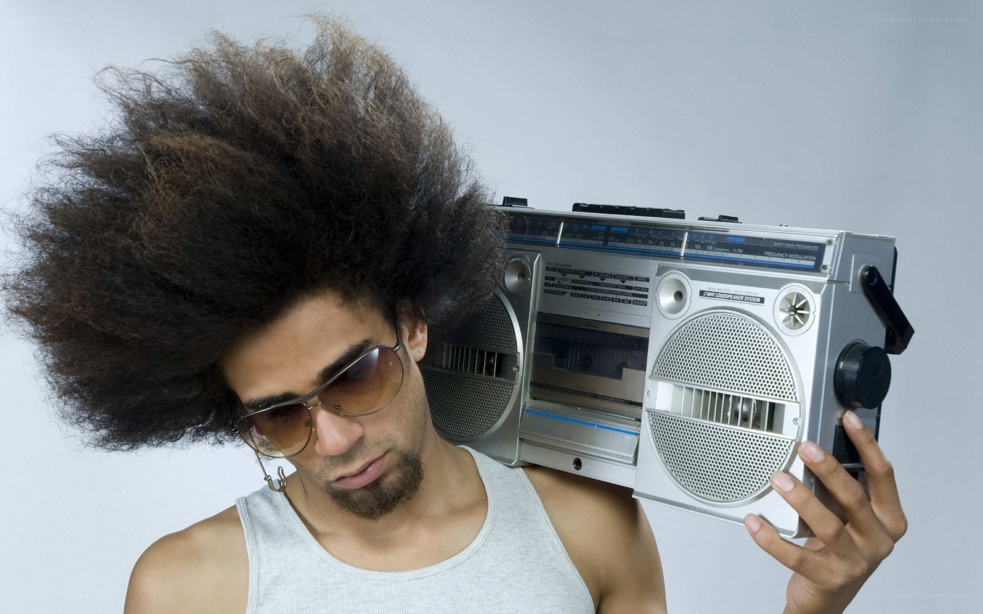 man with boombox and afro
