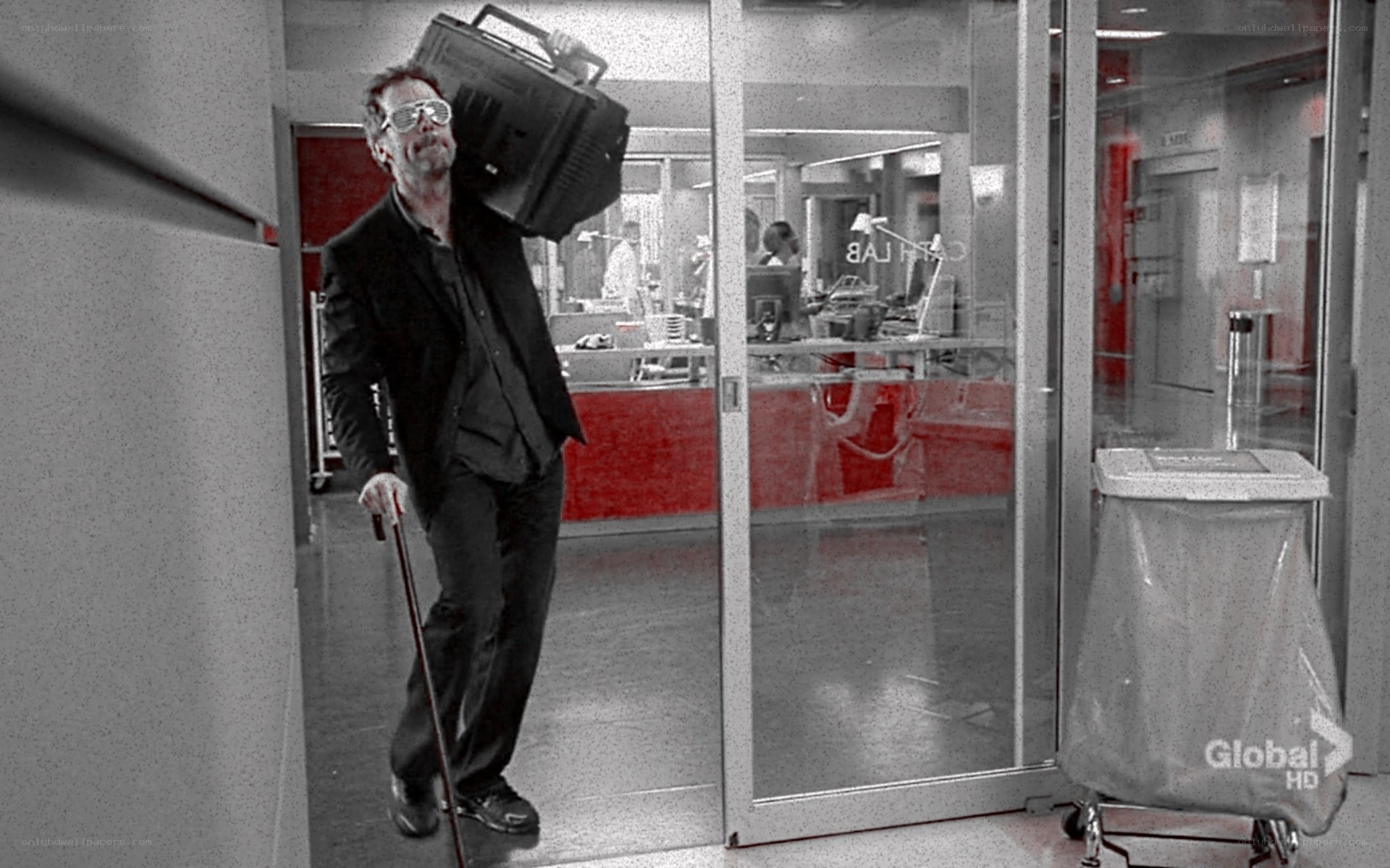 man with boombox and cane