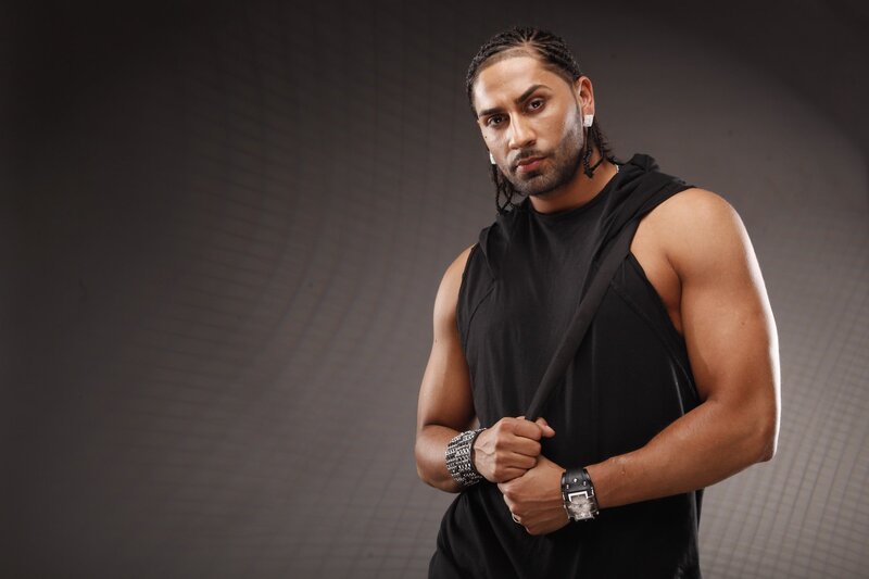 Man with Braided Hair — Black, Serious
