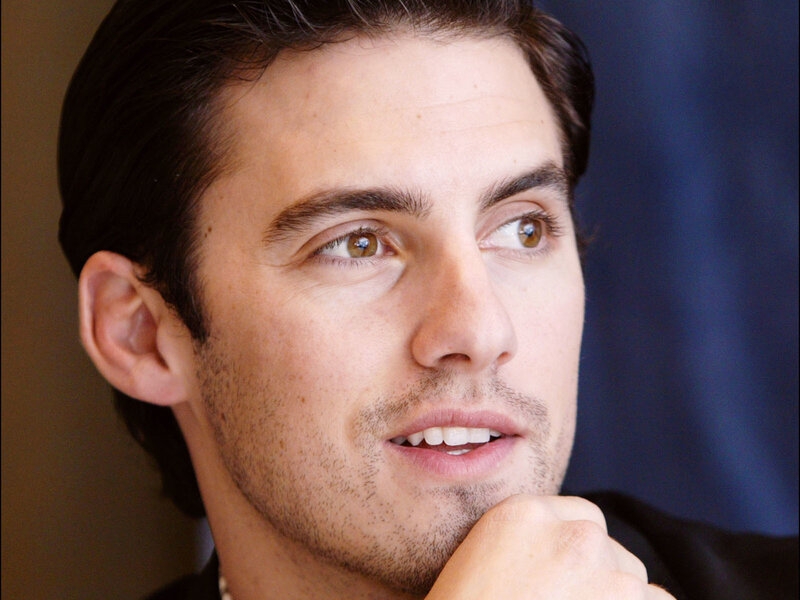 man with brown eyes looking up