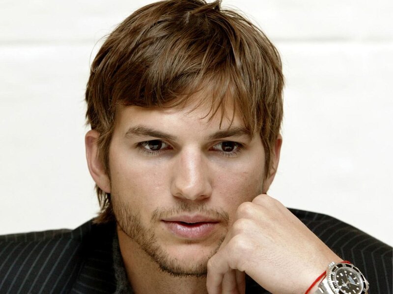 man with brown hair and watch