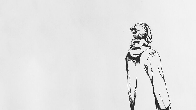 Man with Bun in Hoodie