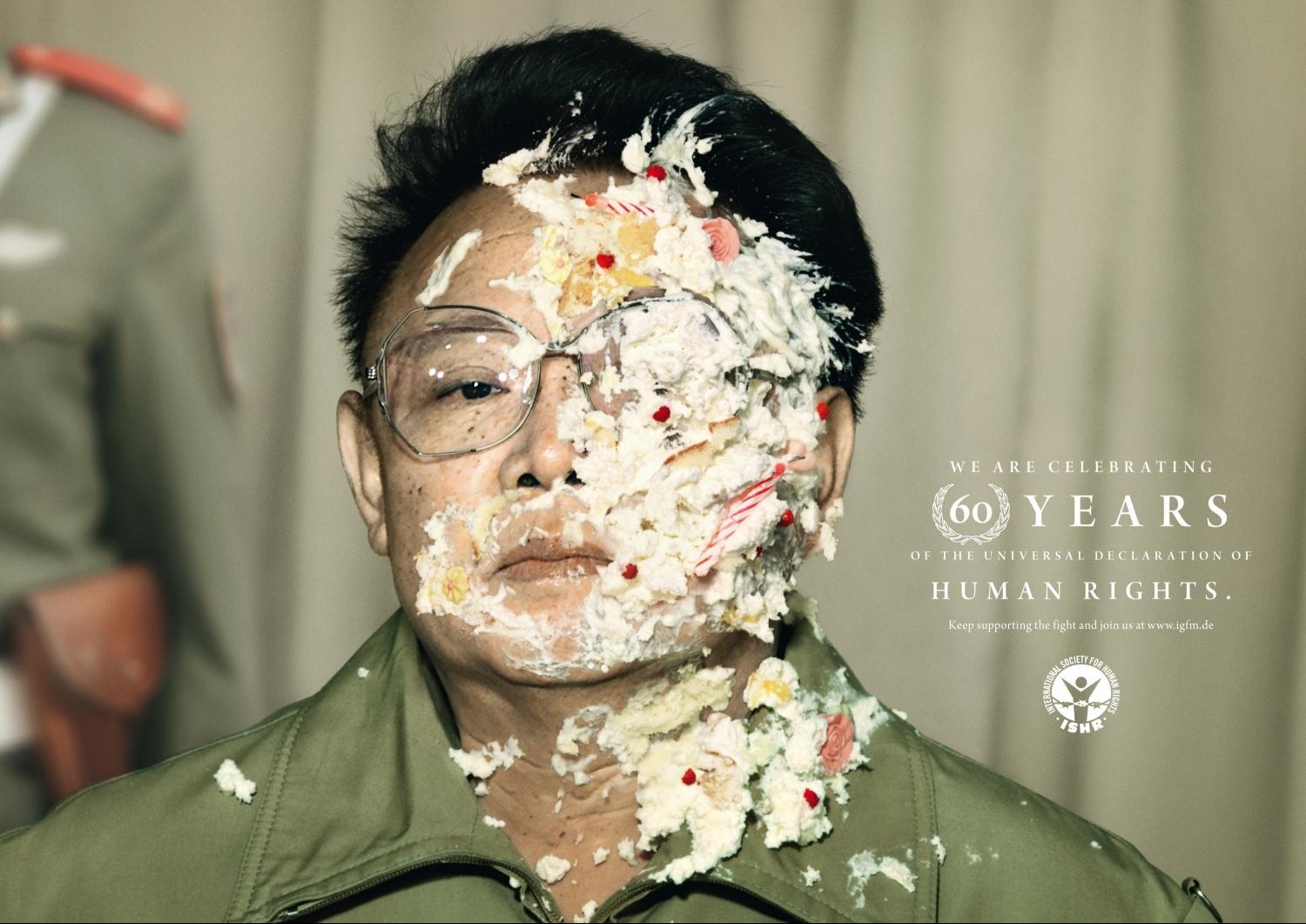 Man with cake on face